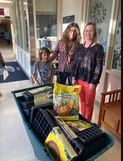 Photo courtesy Leslie Wustrack
Michael Tatum and his grandmother, Cindy Halverson, both gardeners at Pagosa Springs Community Garden, stand with Sally Geren, Pagosa Springs Elementary School administrative assistant.