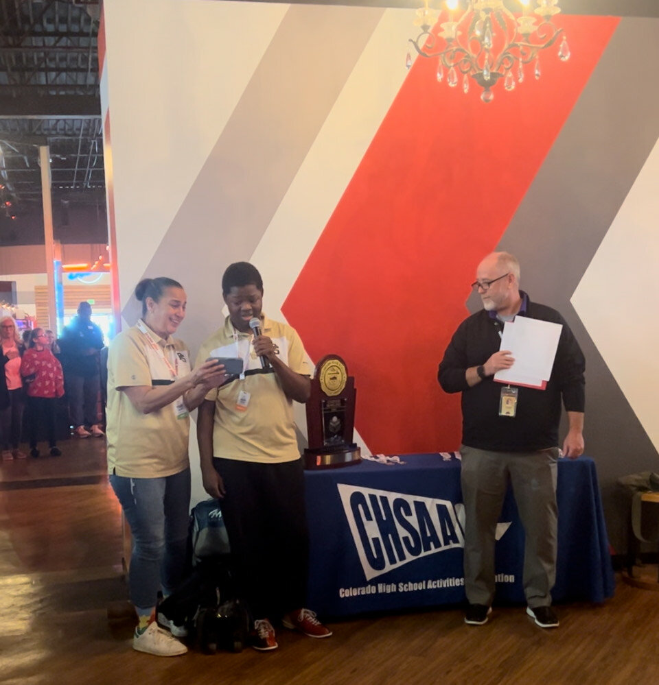 Pirate bowler Juriah Carter takes on a second duty while at the state Unified bowling tournament last week — singing the national anthem a cappella in front of the crowded bowling alley.